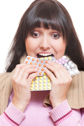 Woman Eating too Many Pills