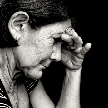 Black and White Photo of Depressed Senior Woman